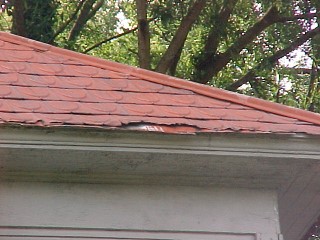 View of a worn edging that requires extra work by the Roof Menders' crew
