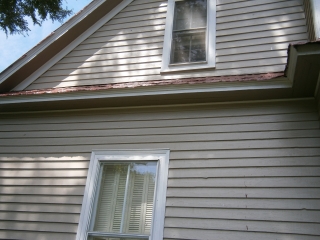 View of edge of roof after work by Roof Menders, Inc