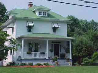 aging green shingle roof