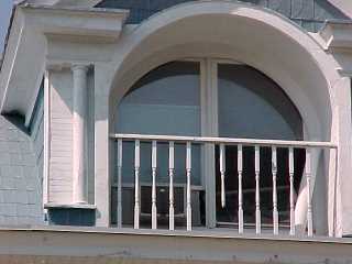 Finished roofing work around fancy window