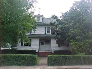 Green standing seam panel roof on Chesapeake Bay