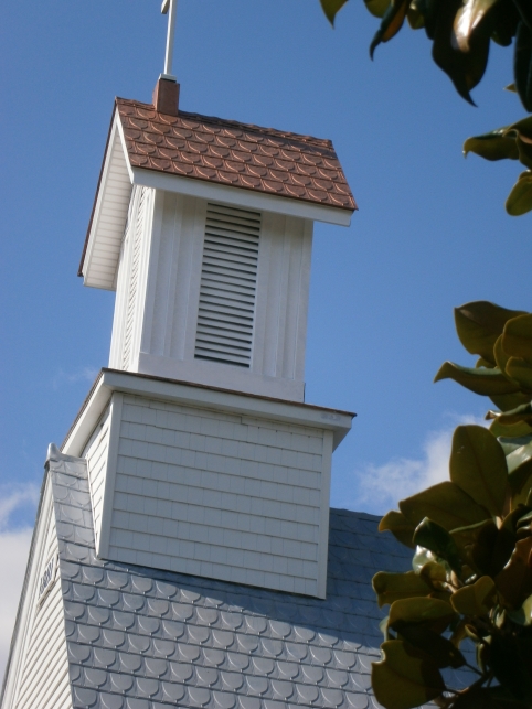 Copper roof over church by Roof Menders